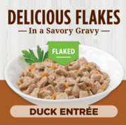 Instinct Cat food with flaked duck entréé in a savory gravy on a white plate.