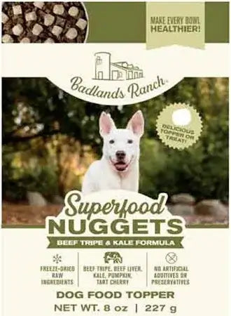 Badlands Ranch Superfood Nuggets dog food topper packaging with a white dog on a natural background.