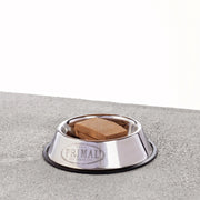 primal raw dog food patties in a bowl