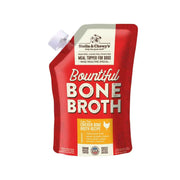 Pouch of Stella & Chewy's Bountiful Bone Broth, a dog food product, with red and white color scheme and branding information.